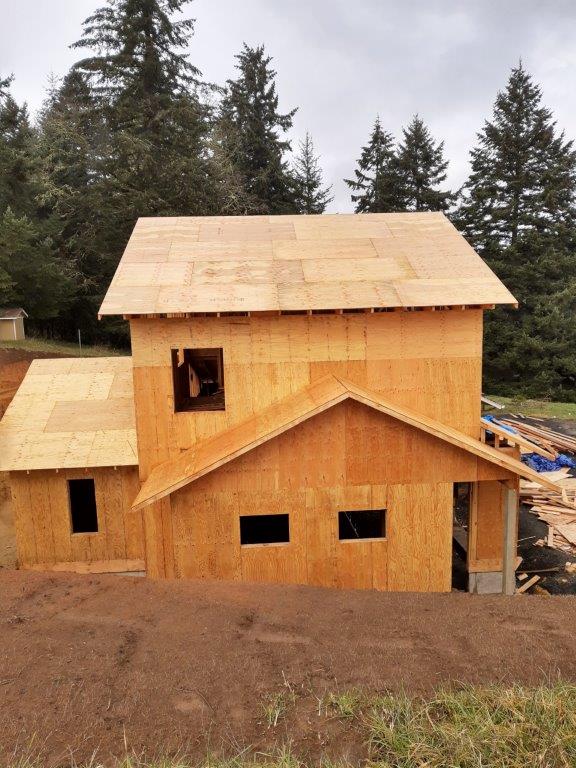 Home addition under construction, rear view