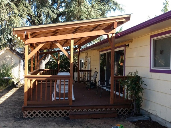 Finished home exterior and patio by Red Umbrella
